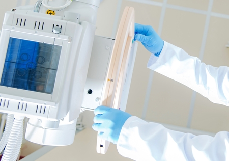 X Ray Imaging Operator Closeup Photo. Healthcare Industry Theme.