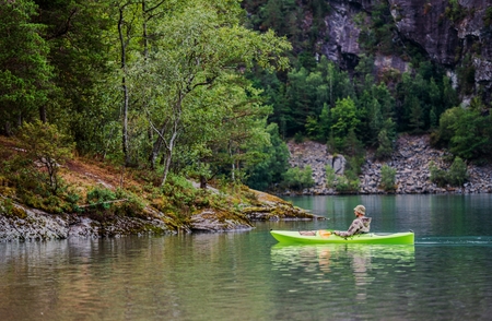 Relaxing Kayak Tour. Caucasian Men on the Scenic Lake.の写真素材