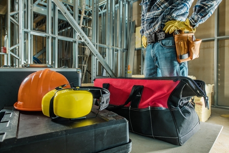 Construction Site Job. Worker and His Equipment. Preparing For the Work. Industrial Theme.の写真素材