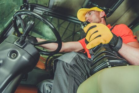 Bulldozer Operator Work. Caucasian Men Operating Heavy Machinery. Industrial Theme.
