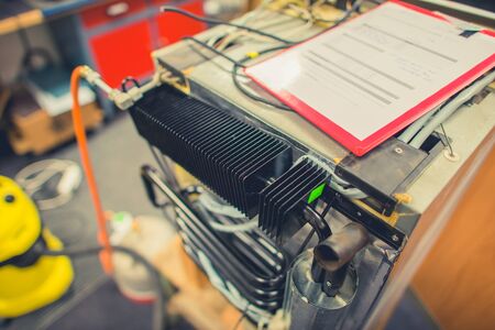 Repairing Broken Camper Van RV Refrigerator. Servicing Motorhome Appliancesの写真素材