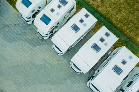 Brand New Modern Camper Vans Dealership Lot Aerial Photo.