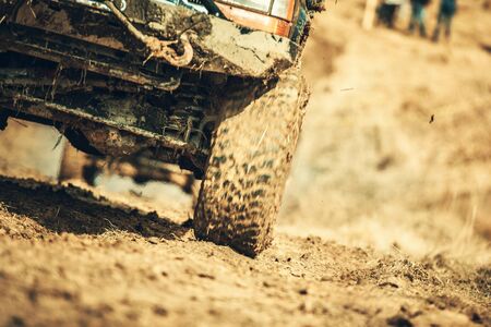 Off Road Vehicle in Action. Motorsport Mud Race. Automotive Theme.の写真素材