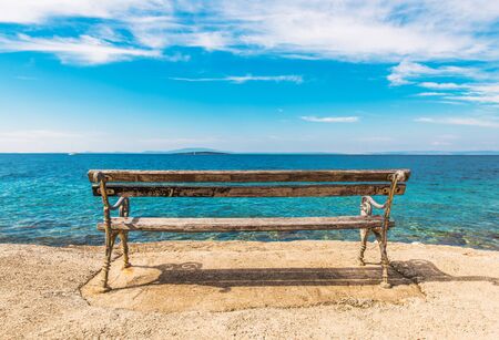 Scenic Sea Front Bench. Adriatic Sea Summer Vacation Destination.の写真素材