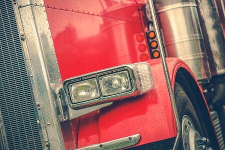 Truck Driving in a Rain. Dangerous Weather Conditions on the Road Concept Transportation Photo.の写真素材