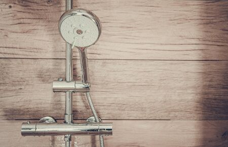 Shower Head and Stylish Ceramic Tiles Cabin. Bathroom Interior.の写真素材