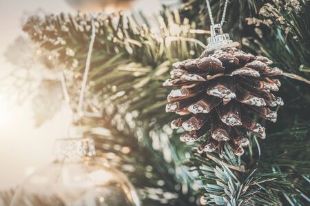 Pine Cone Holiday Ornament. Christmas Tree Decoration Closeup.の写真素材