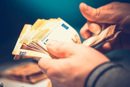 Caucasian Businessman Counting Euro Cash Money. Closeup Video.