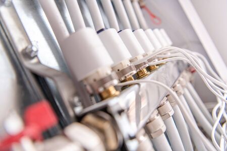 Home Underfloor Heat Valves Container Closeup. Heating Technologies.の写真素材