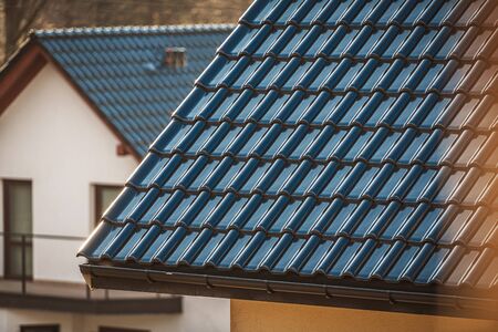 Brand New Ceramic Tiles House Roof. Black Tile Material. Roofing Industry.の写真素材