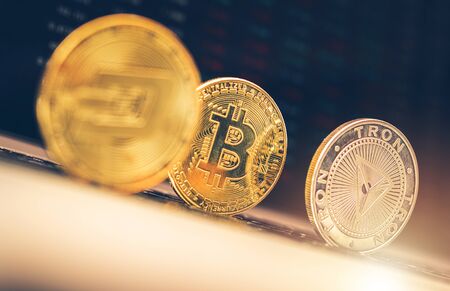 Financial Theme. Dash, Bitcoin and Tron Cryptocurrency Coins Closeup. Concept Photo.の写真素材