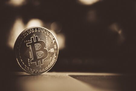 Golden Blockchain Coin. Metal Bitcoin Closeup. Cryptocurrency Theme.の写真素材