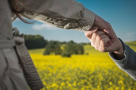 Keep my Hand Parenthood Concept. Caucasian Father and His Daughter. Responsibilities Involved.の写真素材
