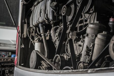 Close Up Of Commercial Coach Bus Engine Components And Elements During Maintenance. 