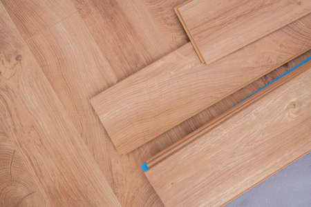 Laminated Residential Floor Panels Close Up. Flooring Industry Theme. Wooden Like Material.の写真素材