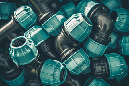 Gardening Systems Theme. Garden Water Irrigation Pipe Connectors Close Up.の写真素材