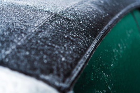 Modern Automotive Materials and Weather Elements. Fabric Convertible Car Roof Covered by Frost and...