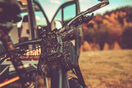 Dirty Mountain Bike and RV Camper Van. Outdoor Active Campsite Time. Biking, Hiking and Camping.の写真素材