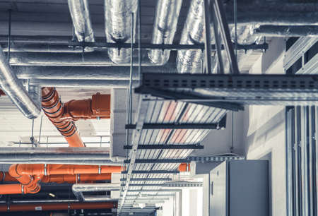 Sanitary, Power and Heating Pipelines System Inside Newly Built Commercial Building.の写真素材