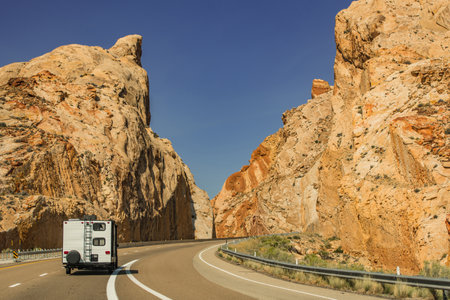 Recreational Vehicle on the United States of America Interstate Highway 70. Travel Trailer Scenic Road Trip in the State of Utahの写真素材