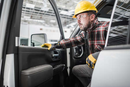 Caucasian Construction Contractor Worker Arrived at Construction Site. Getting Out of His Pickup...