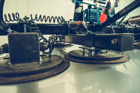 Closeup of Commercial Vacuum Lifting Equipment Using Suction Technology to Grip and Lift Materials. industrial theme.の写真素材