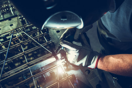Professional Welder Welding Metal Elements. Metalworking Industry Theme.の写真素材