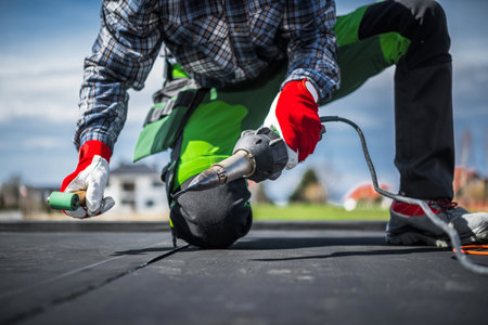 EPDM Membrane Installation Using Hot Air Blower. Ethylene Propylene Diene Terpolymer Material....