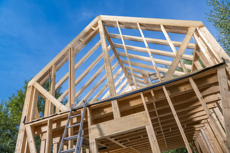 Wooden Skeleton Frame of Newly Building House. Construction Industry Theme.