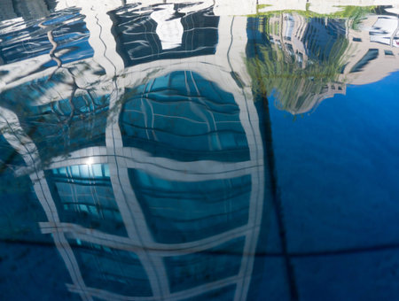 An court of villa with an swimming pool and a view looking out to the river beside during sunset.HDR shot from three picturesの写真素材