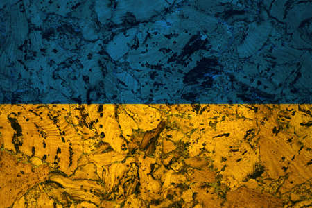 Ukrainian flag on the background texture. Concept for designer solutions.
