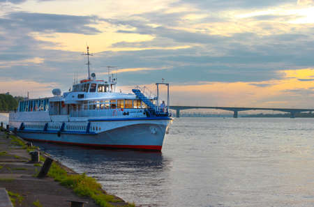 The ship Almaz with passengers departs from the pier of the river port of Permの写真素材