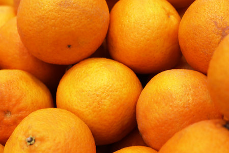 Oranges on the shelf in the store close-up.の写真素材