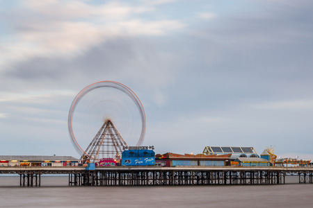 Blurring the movement of the wheel on Central Pier in Blackpool.のeditorial素材