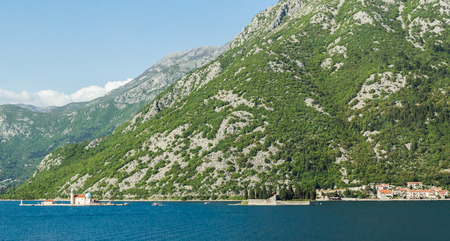 The breath-taking scenery seen in the Bay of Kotor â?? surrounded by grey rugged mountains & rich...