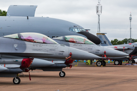 F-16C from the USAF seen next to a tanker at the 2017 Royal International Air Tattoo at Royal Air Force Fairford in Gloucestershire - the largest military airshow in the world.のeditorial素材