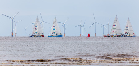 Four Clipper yachts depart Liverpool at the beginning of their round the world race.The Clipper Race (now in its eleventh year) sees twelve global teams compete in a 40000 nautical mile around the world race on a 70 foot ocean racing yachts.The teams leftのeditorial素材