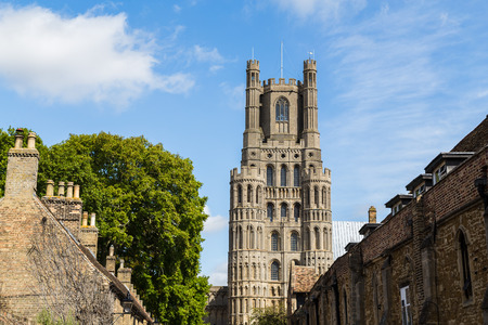Looking up a traditional street in Ely towards the city's Anglican cathedral.の写真素材