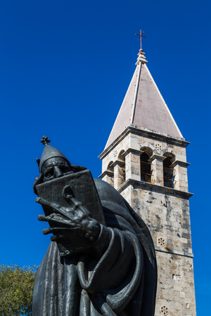 Marko Marulic was a Croatian national poet and Renaissance humanist born in the 15th century.  This remarkable statue stands for the literary presence that is felt throughout Split. The statue was created by Ivan Mestrovic and was unveiled in 1925.の写真素材