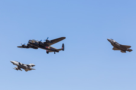 Homage to the Dambusters Squadron featuring the Lancaster bomber, a Tornado GR4 and the new F-35b Lightning II.  Captured at the 2018 Royal International Air Tattoo at RAF Fairford in Gloucestershire.のeditorial素材