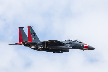 One of the three special coloured heritage F-15E Eagles taking off from RAF Lakenheath, Suffolk in...