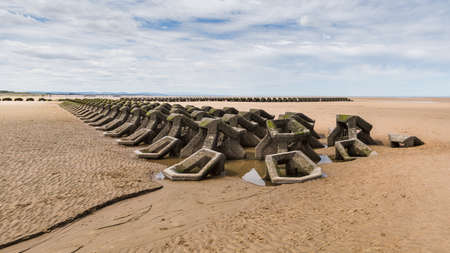 Sea defences on Wallasey beach seen in July 2020 near Liverpool.の写真素材