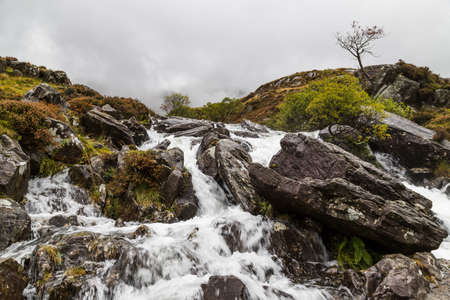 Water pictured crashing down the Glacial valley in the Snowdonia National Park in October 2021 after...