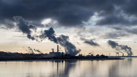 Manchester Ship Canal passes an industrial corner of the Mersey Estuary one winters day in December...