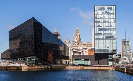 Looking across one the docks in Liverpool towards the modern Mann Island complex in September 2020.のeditorial素材