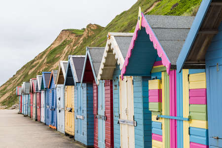 Pretty beach huts on Sheringham seafront seen in June 2021 on the North Norfolk coast.のeditorial素材