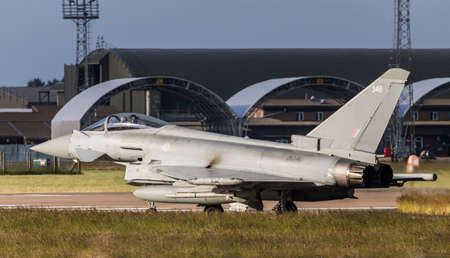 RAF Typhoon taxis to the runway at Coningsby (Lincolnshire) air base for a training sortie in June 2021.のeditorial素材