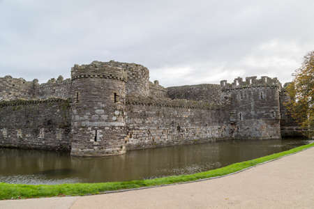 Beaumaris Castle seen from the roadside in Anglesey on the North Wales coast in October 2021.のeditorial素材