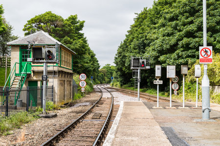 A pair of railway lines lead out of Cromer train station passed a signal box seen in June 2021.のeditorial素材