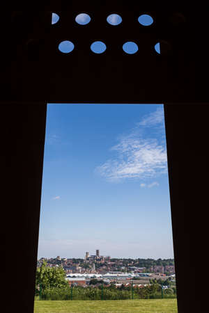 Lincoln cathedral framed by the Memorial Spire.  The spire is a memorial to the 57,000 men who lost their lives during WW2 defending England as part of bomber command.のeditorial素材